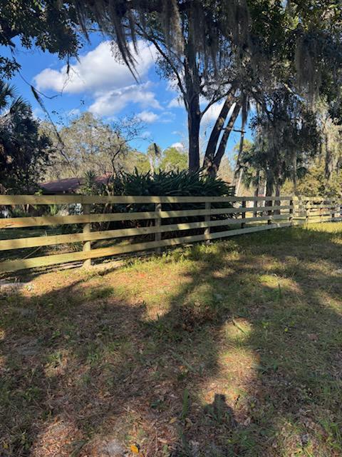 wood horizontal fence installed by top rail fence