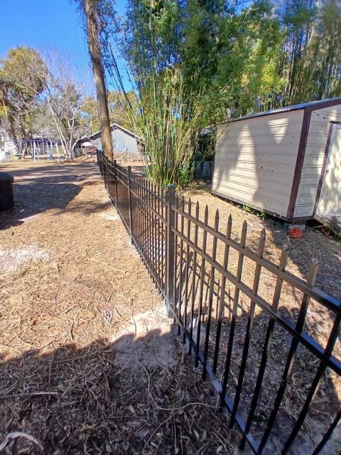 ornamental picket installed by top rail fence