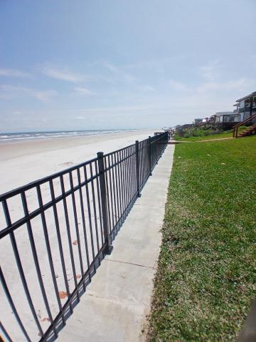 ornamental horizontal fence installed by top rail fence