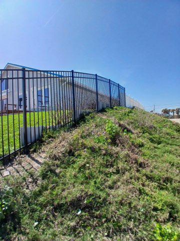 ornamental horizontal fence installed by top rail fence