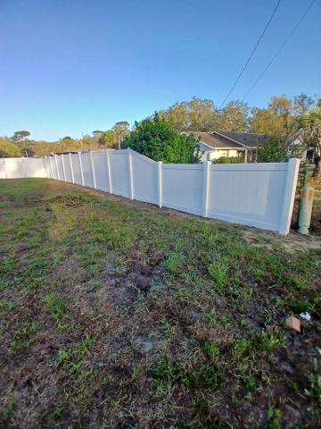 vinyl privacy fence installed by top rail fence