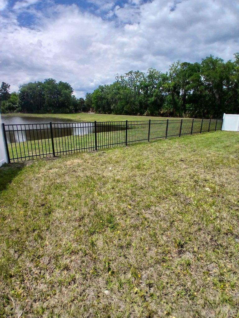 ornamental horizontal fence installed by top rail fence