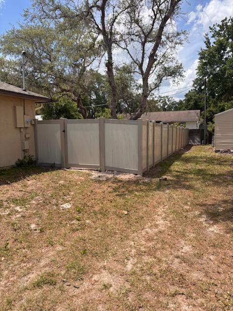 vinyl privacy fence installed by top rail fence