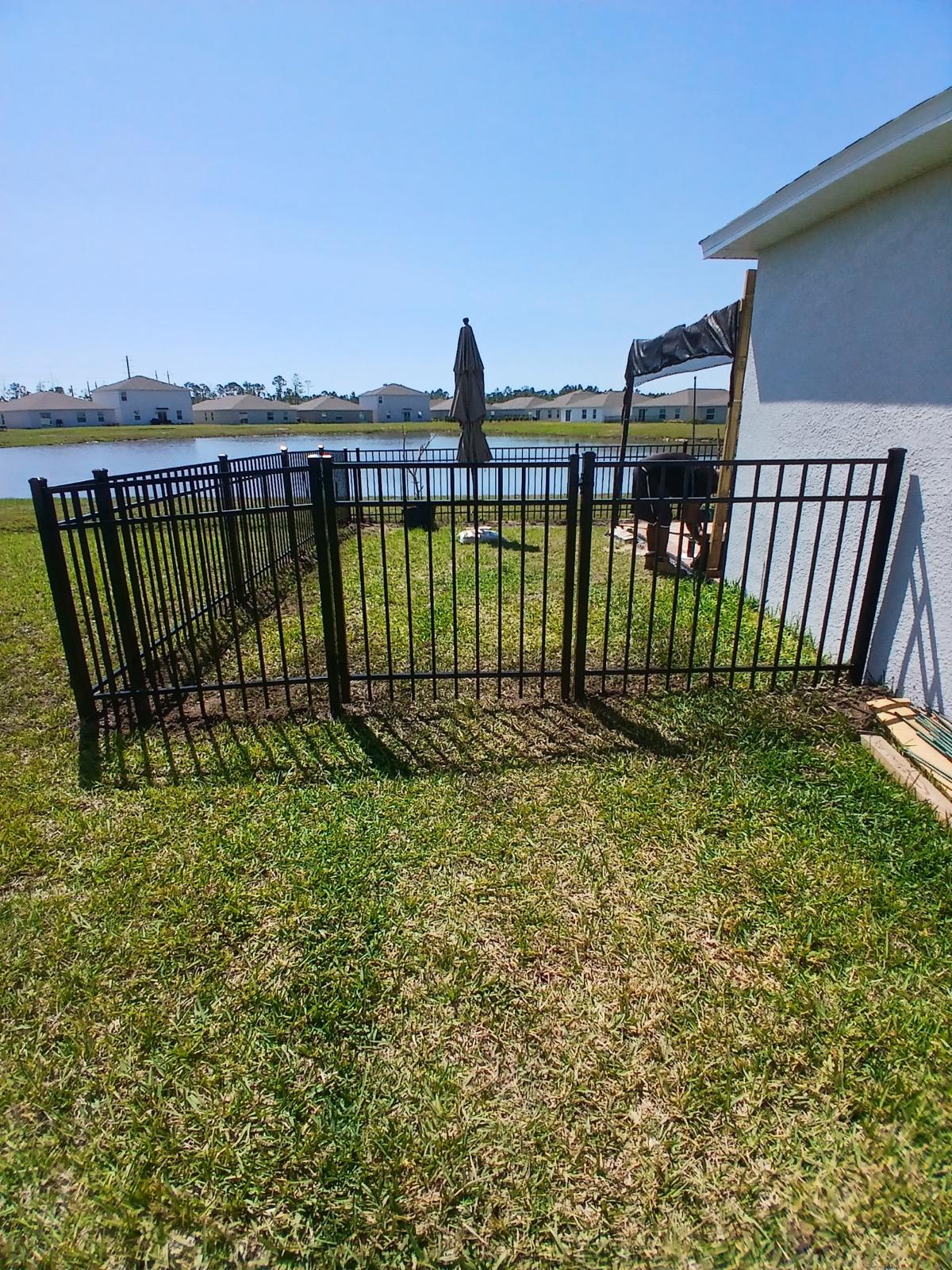 ornamental horizontal fence installed by top rail fence