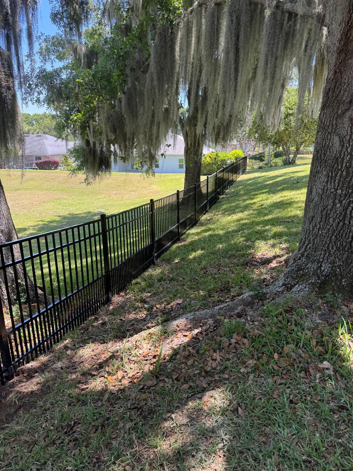 ornamental horizontal fence installed by top rail fence