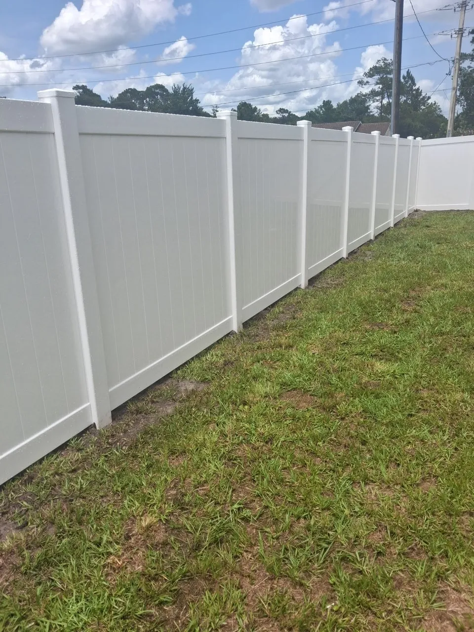 vinyl privacy fence installed by top rail fence