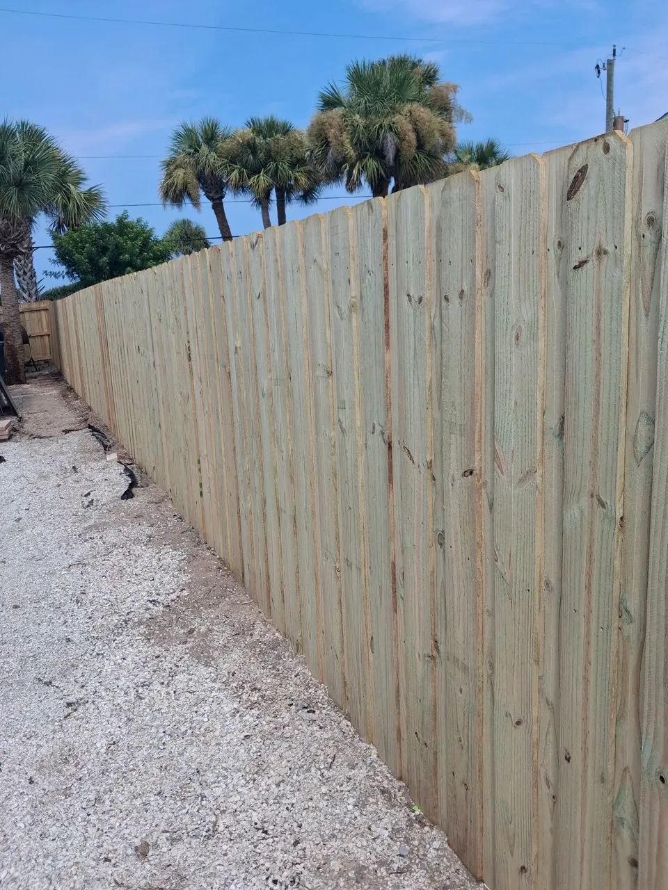 wood board on board fence installed by top rail fence