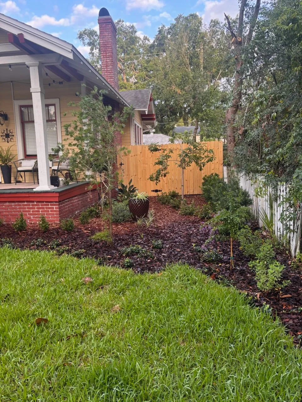 wood stockade fence installed by top rail fence
