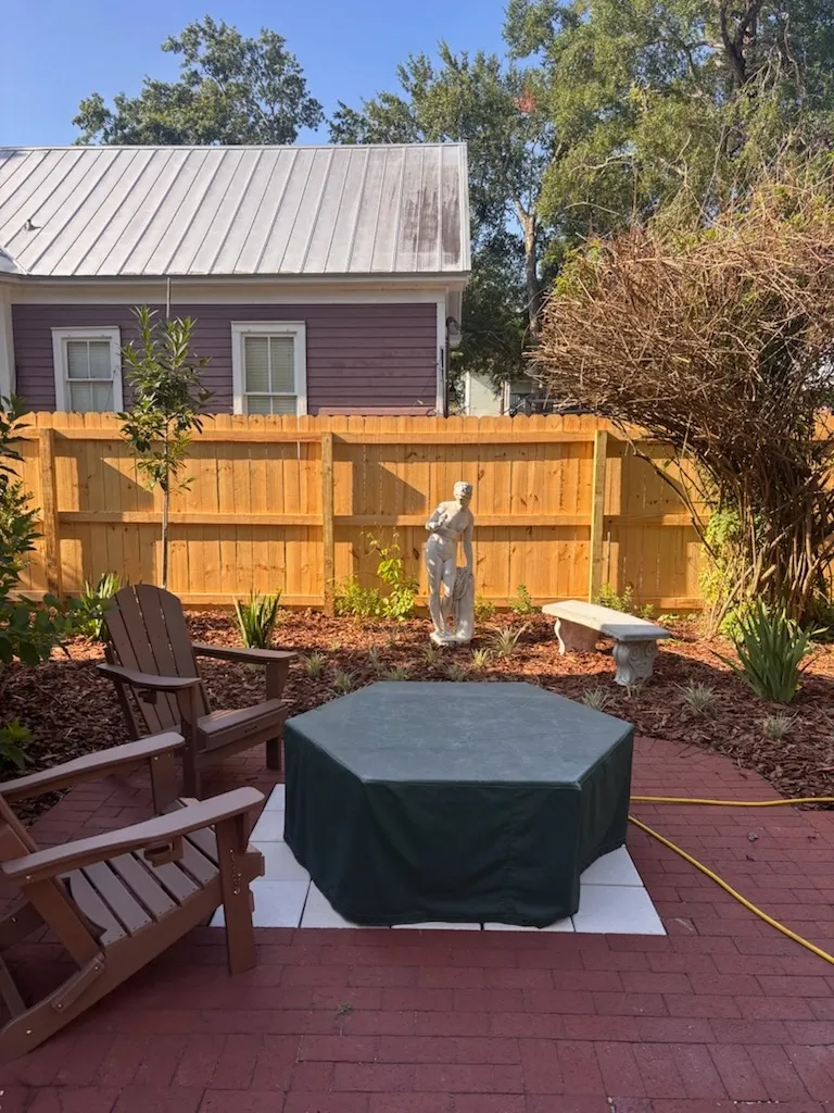 wood stockade fence installed by top rail fence
