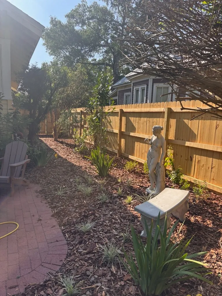 wood stockade fence installed by top rail fence
