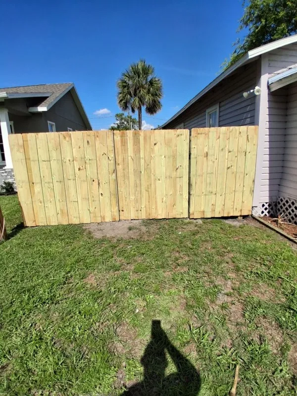 wood board on board fence installed by top rail fence