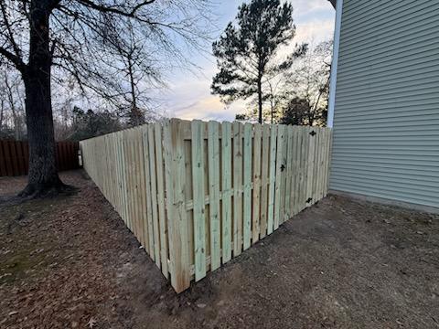 shadowbox fence installed by top rail fence