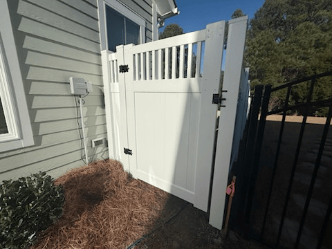 vinyl lattice top gate installed by top rail fence
