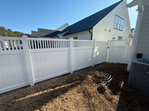 vinyl privacy fence installed by top rail fence