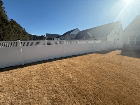 vinyl privacy fence installed by top rail fence