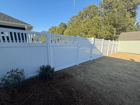 vinyl privacy fence installed by top rail fence