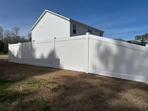 vinyl privacy fence installed by top rail fence