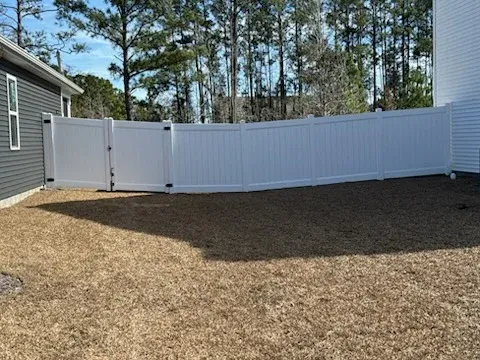 vinyl privacy fence installed by top rail fence