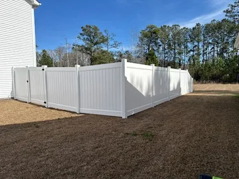 vinyl privacy fence installed by top rail fence