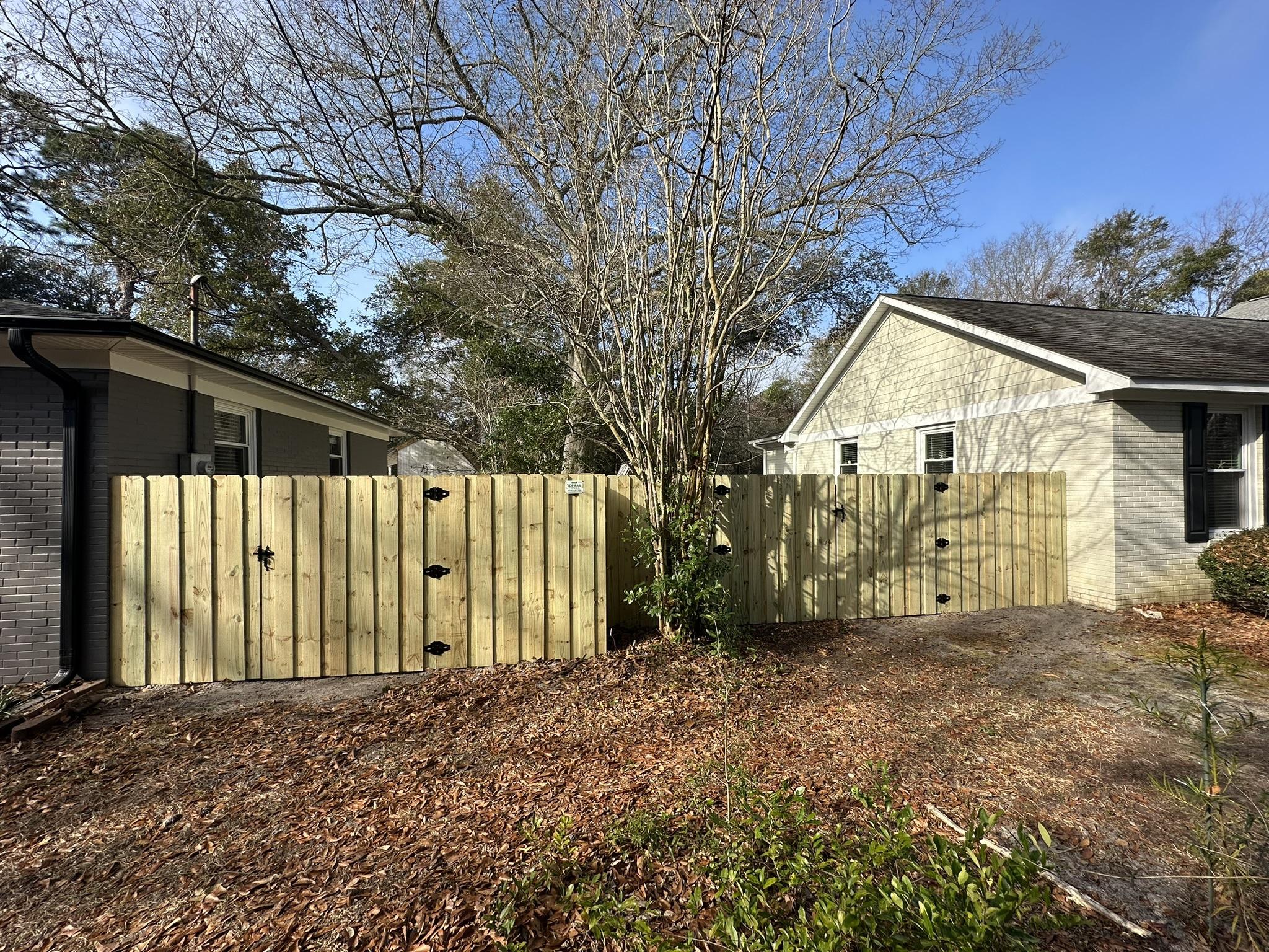 wood board on board fence installed by top rail fence