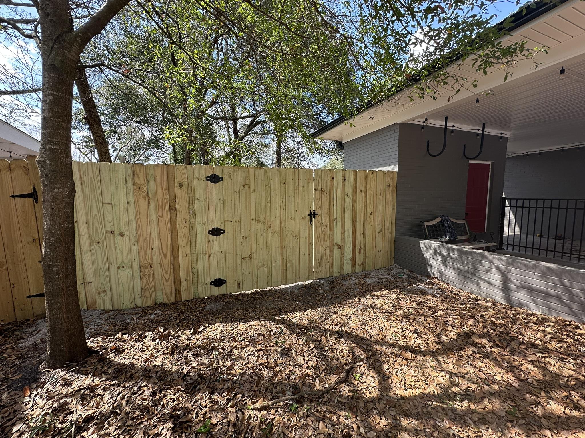 board on board wood fence installed by top rail fence