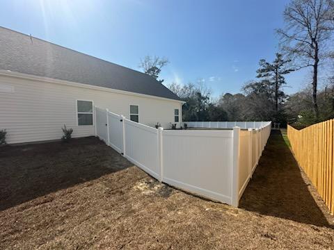 vinyl privacy fence installed by top rail fence
