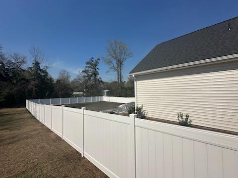 vinyl privacy fence installed by top rail fence