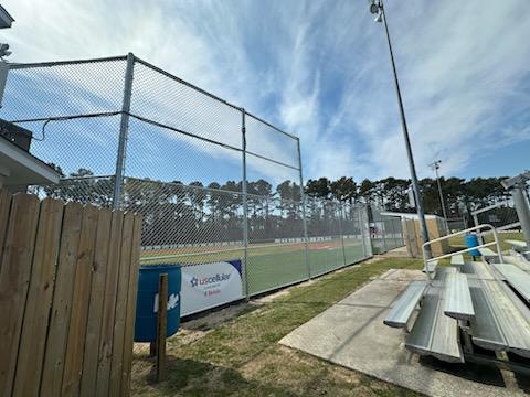 chain link fence installed by top rail fence