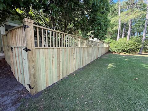 lattice top fence installed by top rail fence