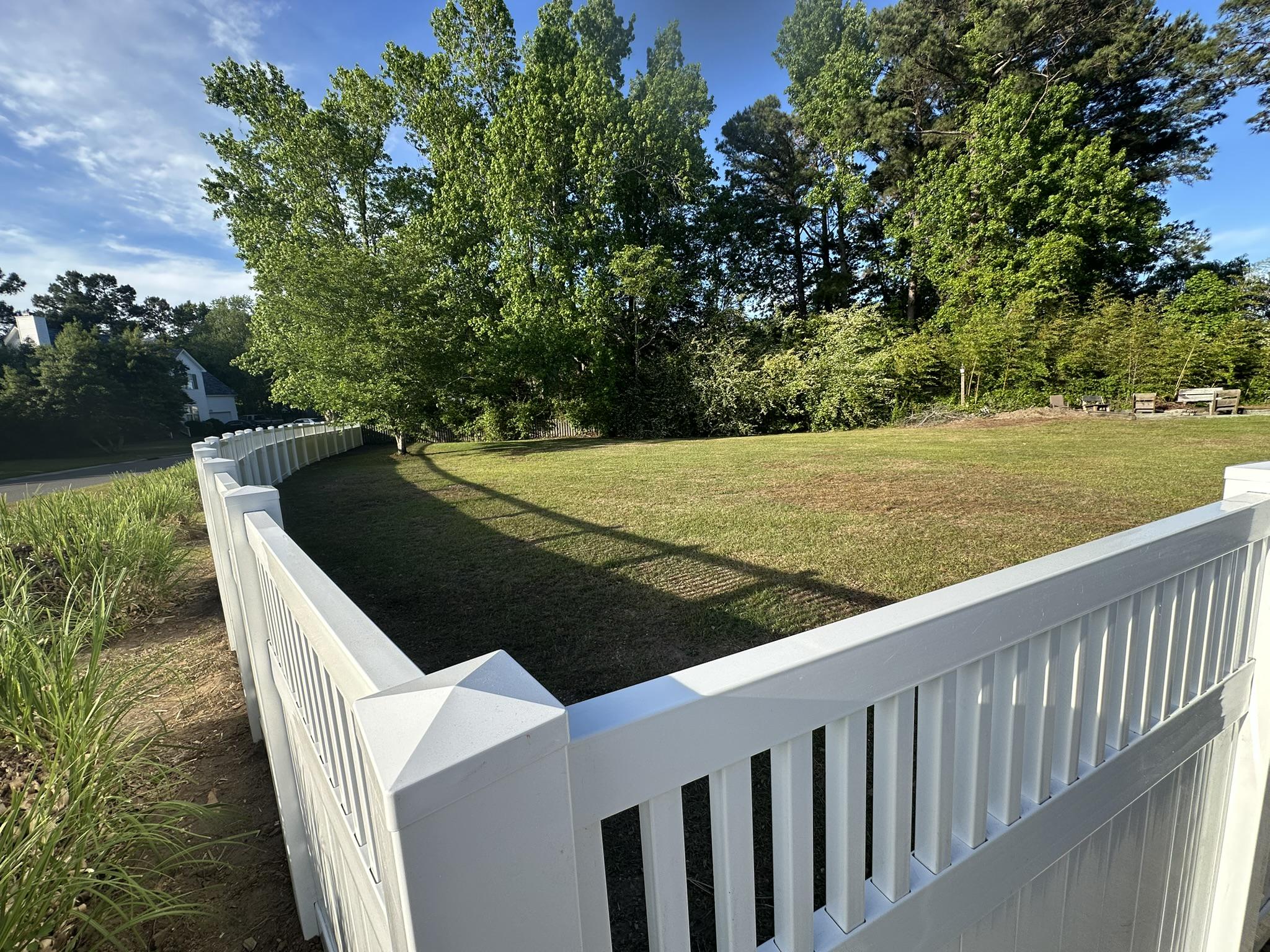 vinyl lattice top fence installed by top rail fence