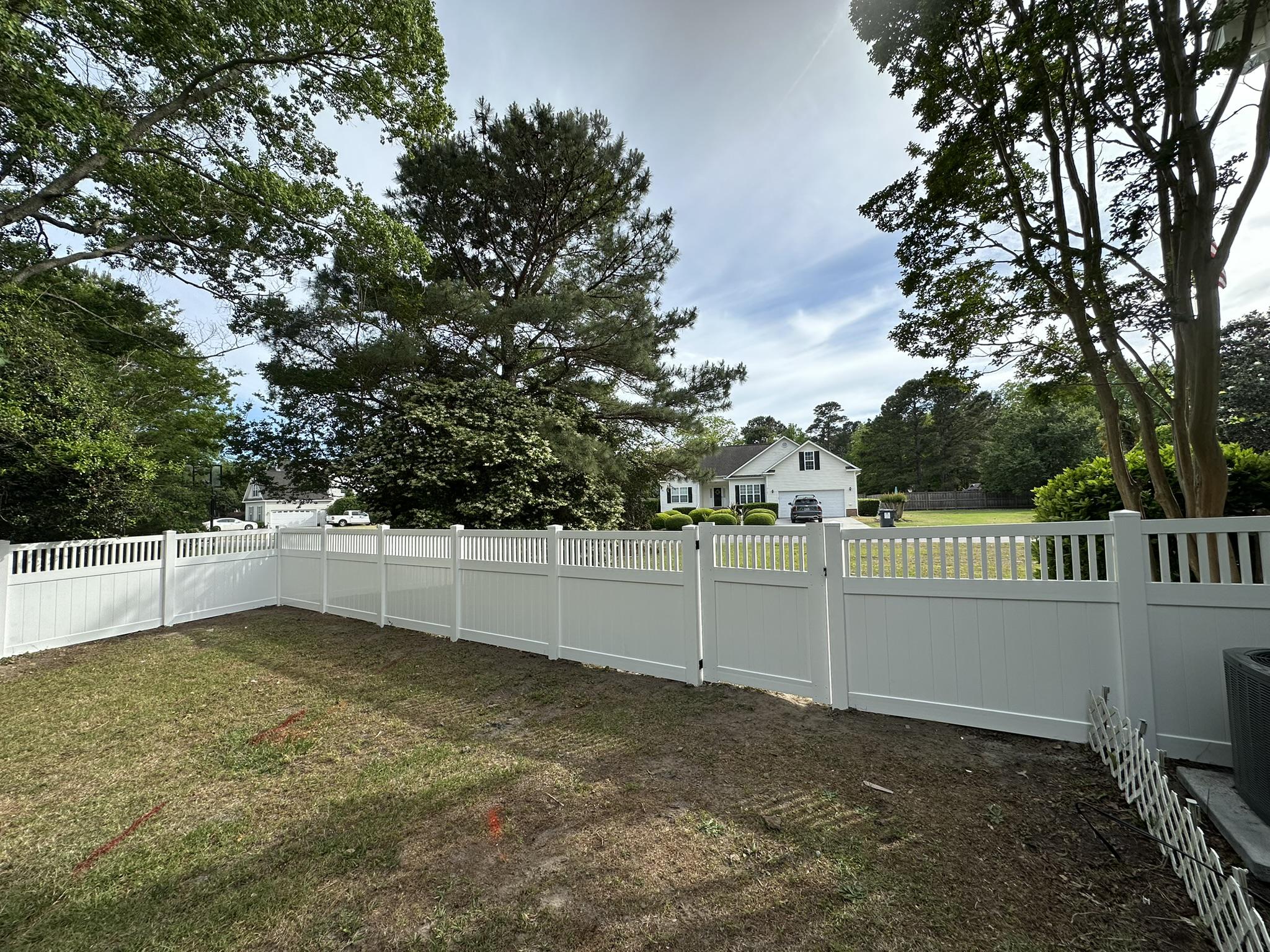 vinyl lattice top fence installed by top rail fence