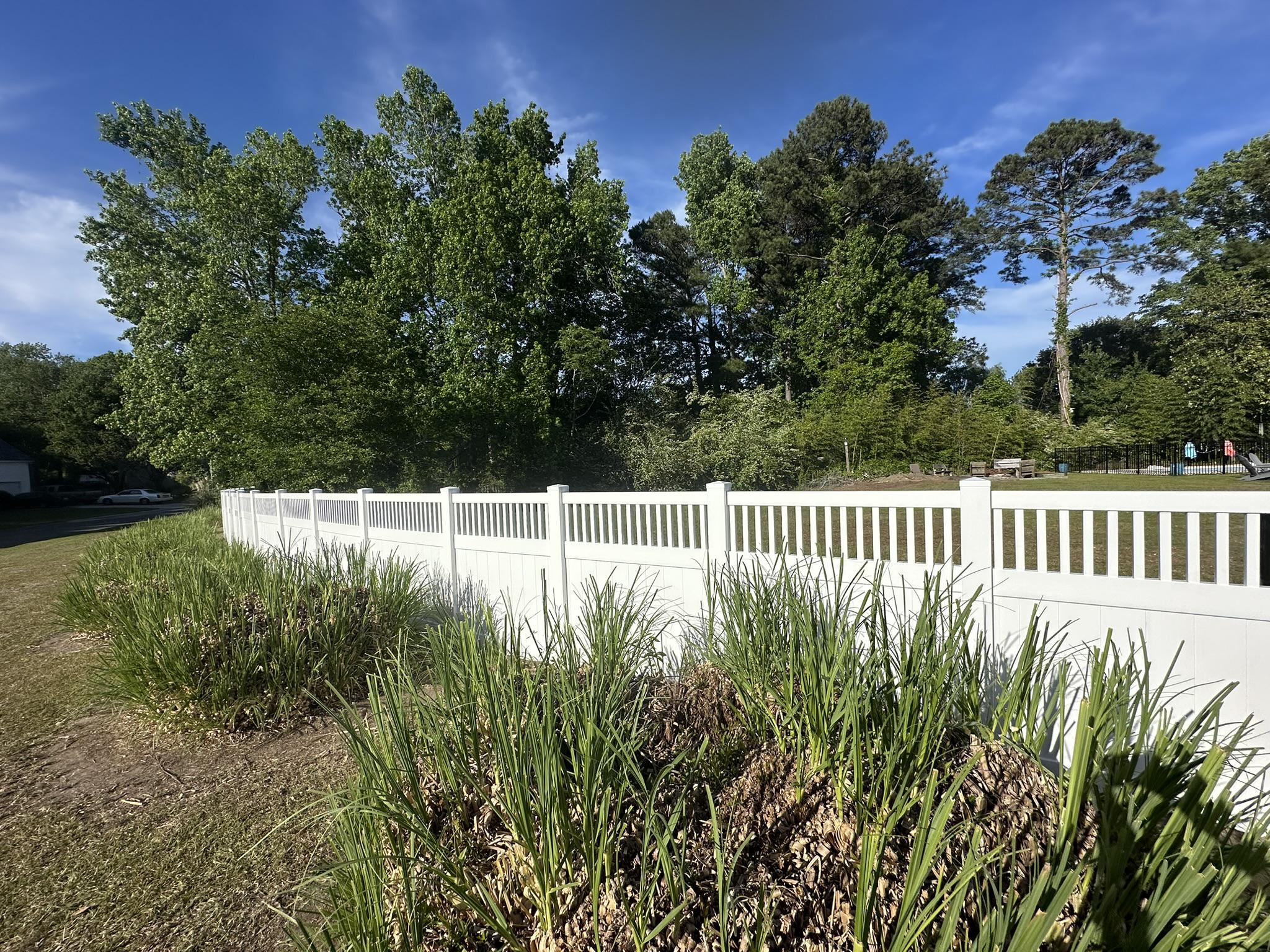vinyl lattice top fence installed by top rail fence