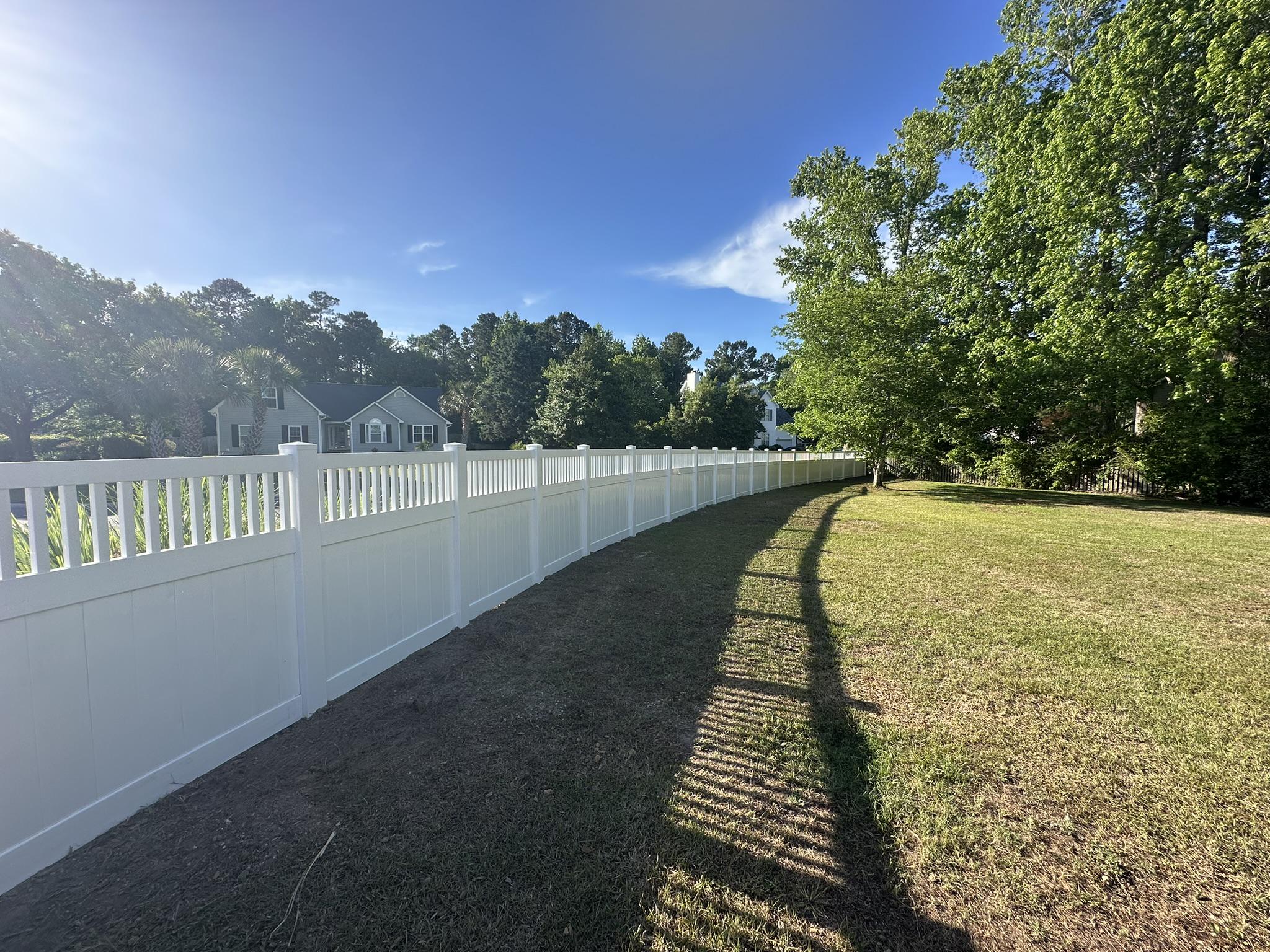 vinyl lattice top fence installed by top rail fence