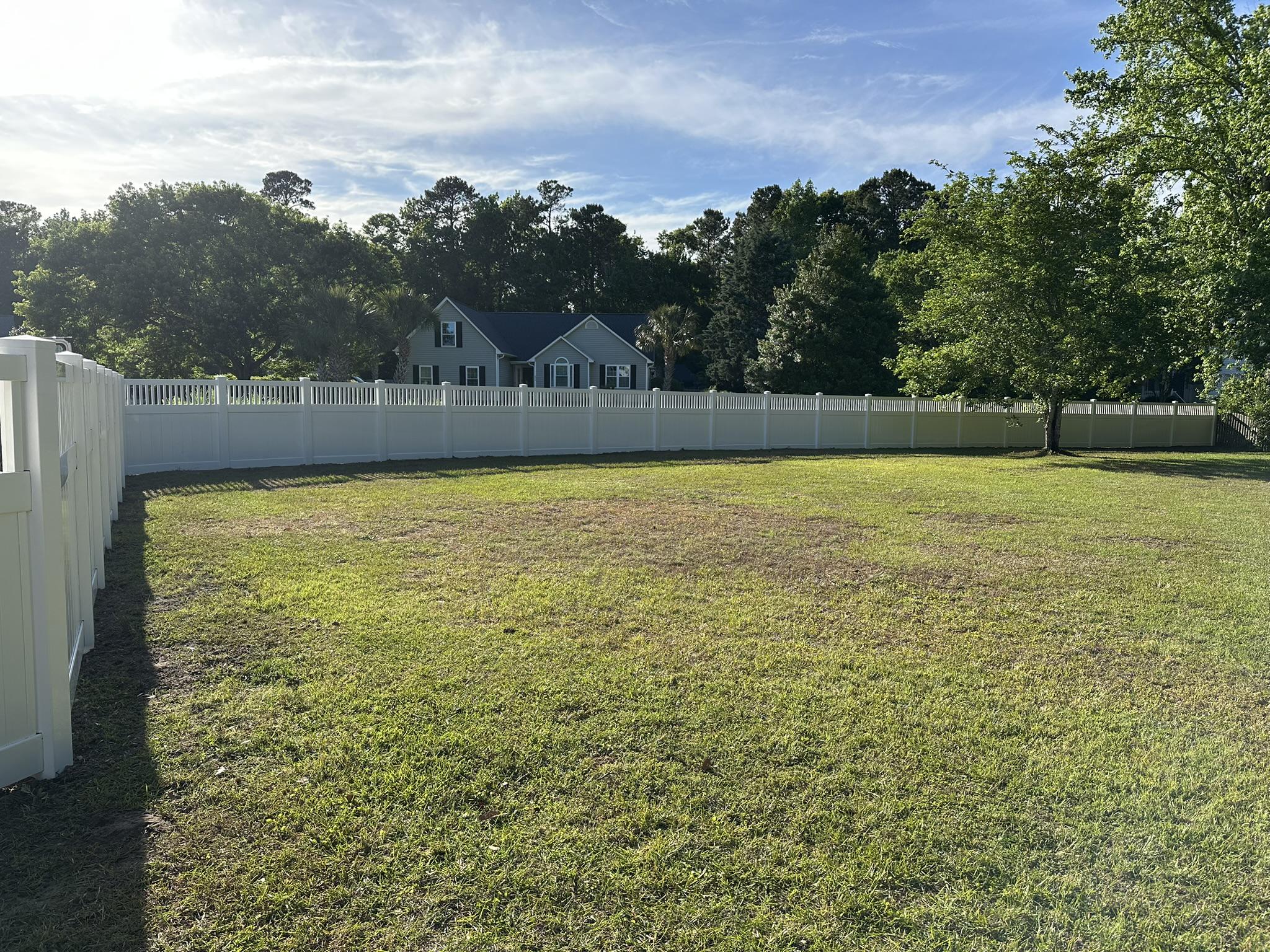 vinyl lattice top fence installed by top rail fence