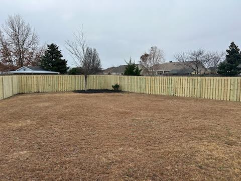 wood shadowbox fence installed by top rail fence