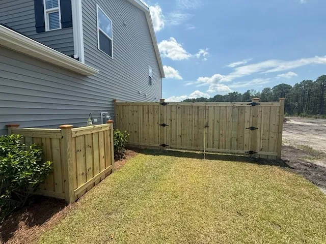wood board on board fence installed by top rail fence