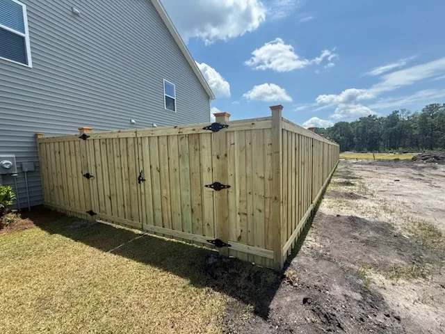 wood board on board fence installed by top rail fence