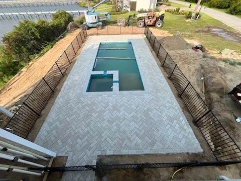 two rail ornamental metal fence installed by top rail fence