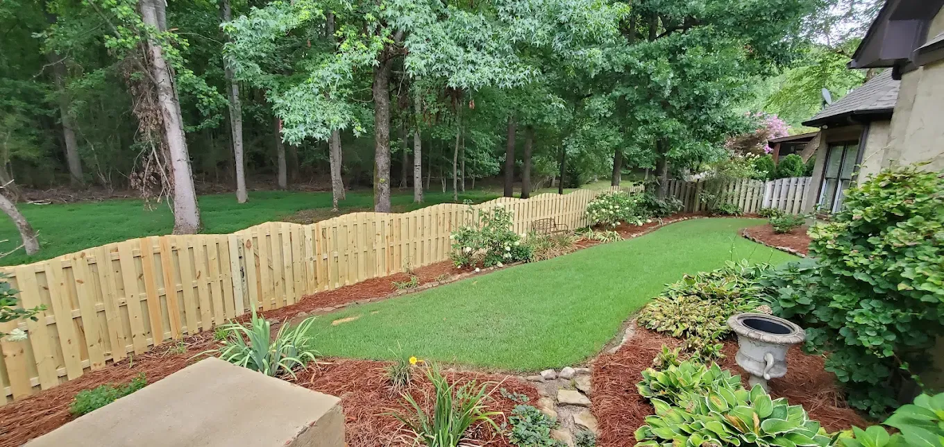wood shadowbox fence installed by top rail fence