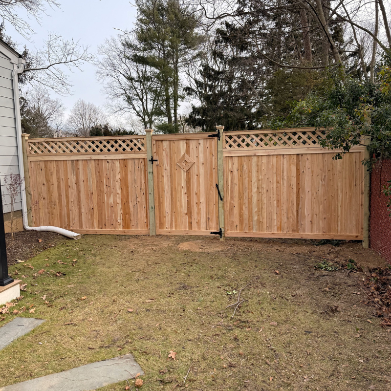 cedar fence installed by top rail fence