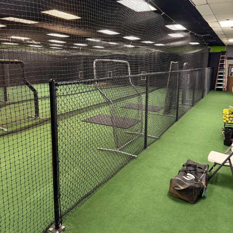 black chain link fence installed by top rail fence