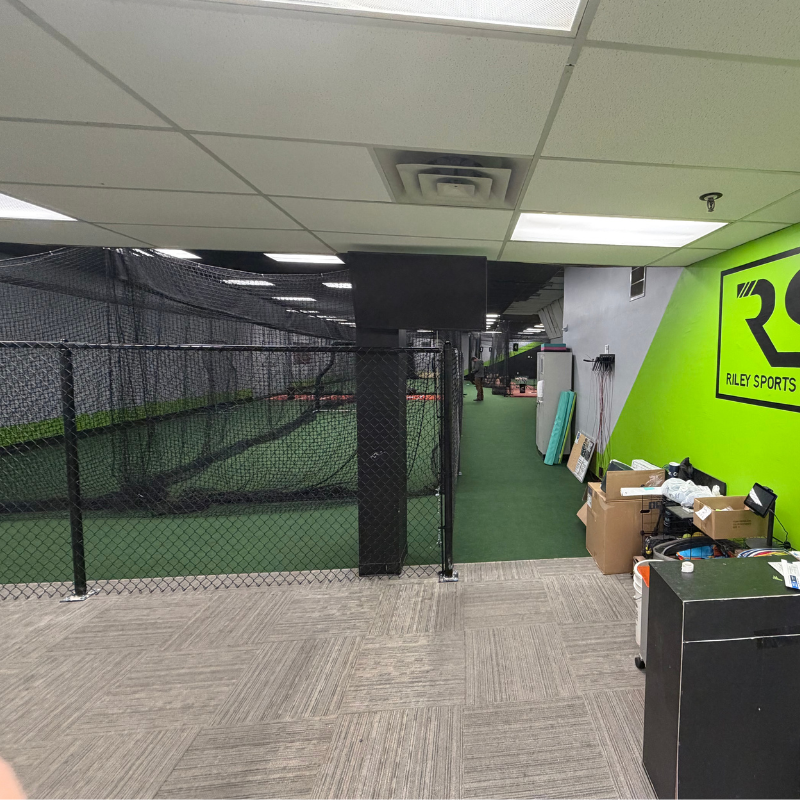 black chain link fence installed by top rail fence