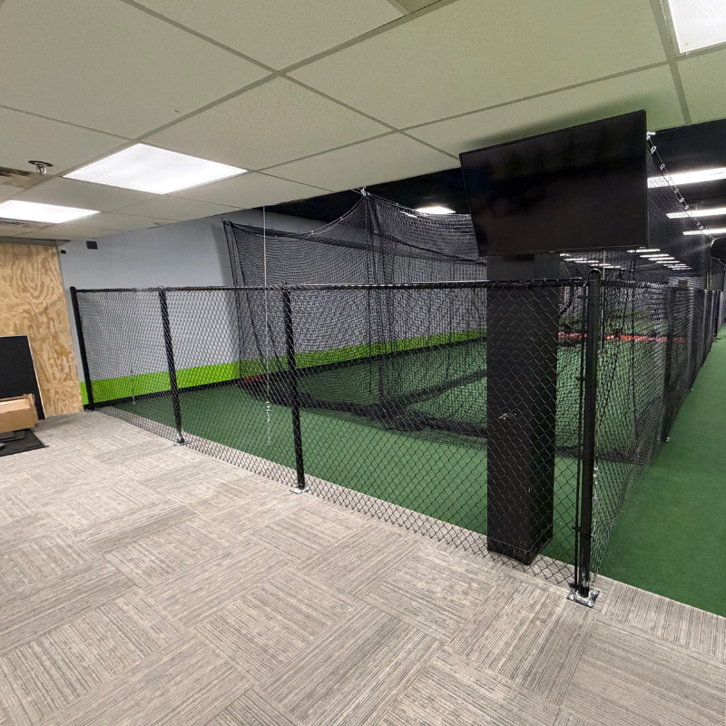 black chain link fence installed by top rail fence