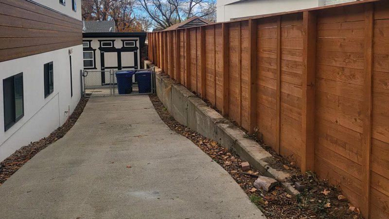 Tanned vinyl fence installation job