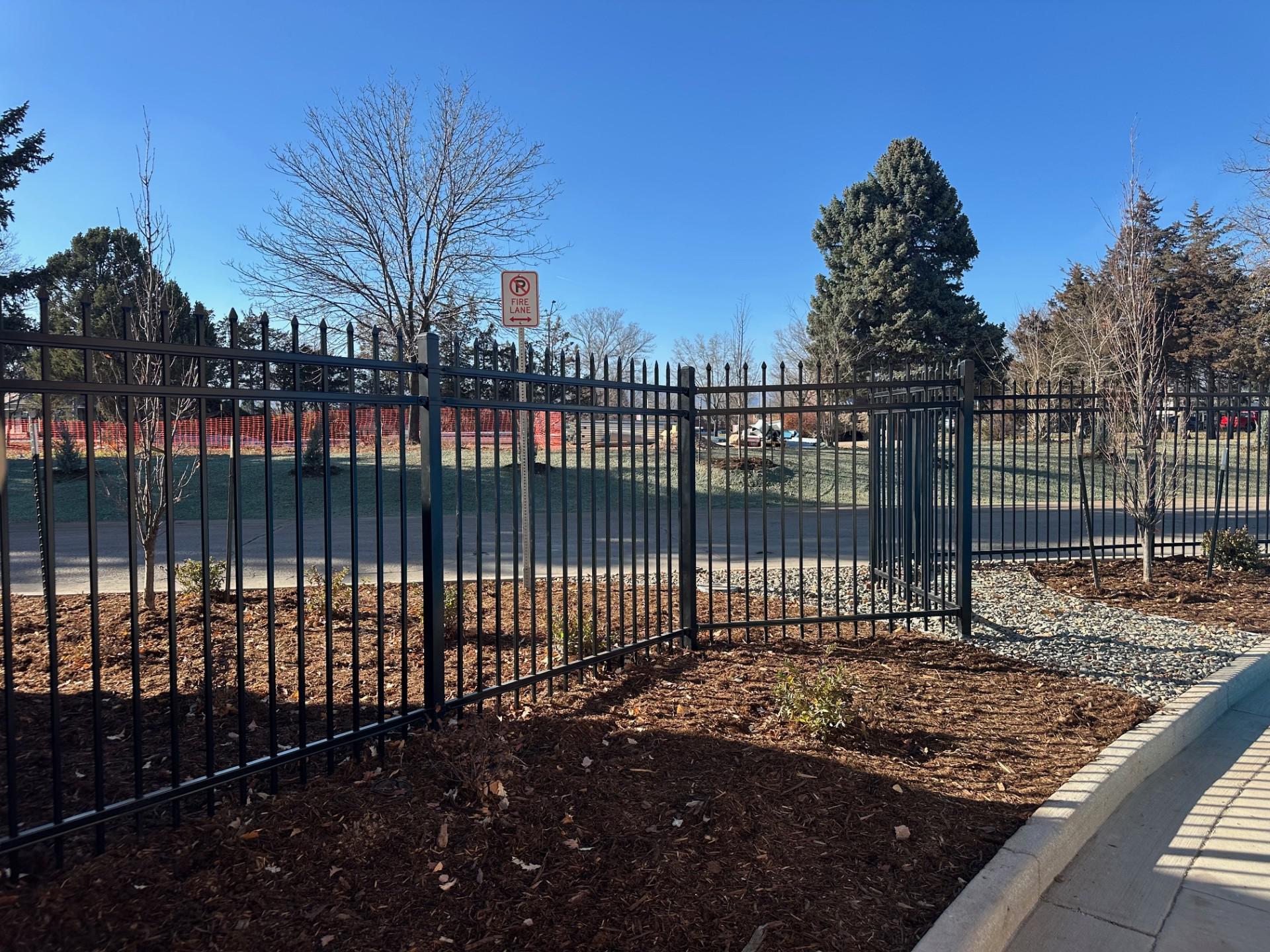 aluminum fence installed by top rail fence