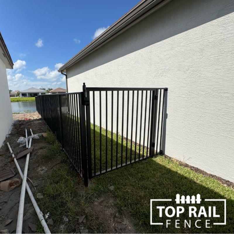 aluminum fence installed by top rail fence