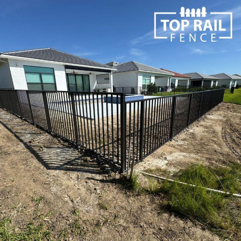 aluminum fence installed by top rail fence