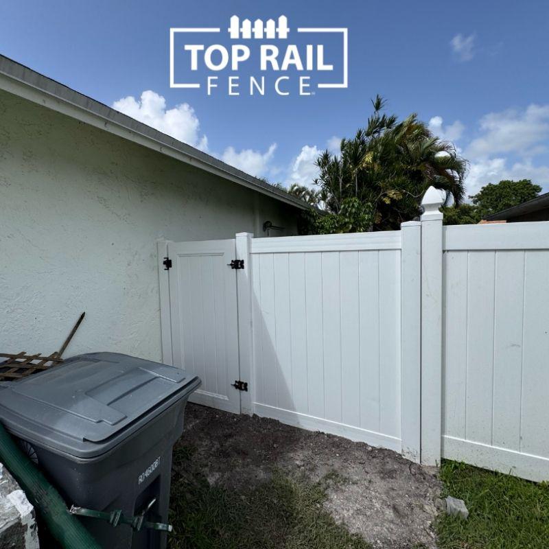 vinyl fence installed by top rail fence