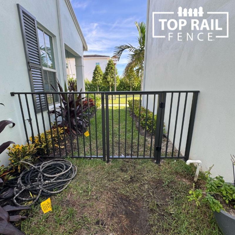 aluminum fence installed by top rail fence
