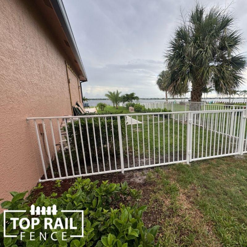 aluminum fence installed by top rail fence